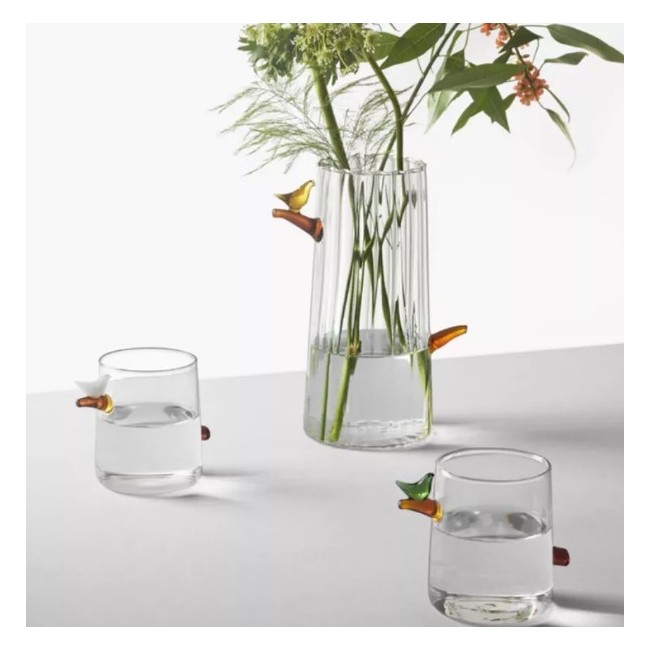 bicchiere acqua uccellino ambra