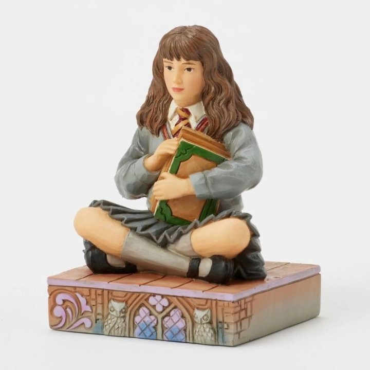 Enesco Jim Shore Hermione con libri